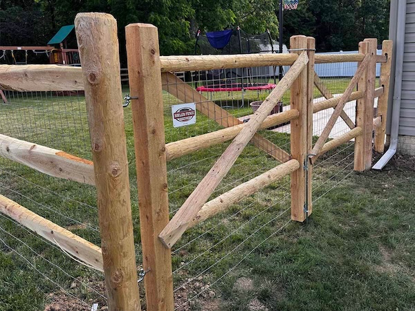 Wood Fence Gate Installation with Wire Livestock Fencing